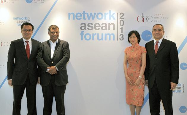 A media conference is held to launch the inaugural Network Asean Forum. From left to right are NAF chairman Patrick Walujo, managing partner of Northstar Pacific Group; AirAsia group CEO Tony Fernandes; and two NAF convenors, Straits Trading Co executive